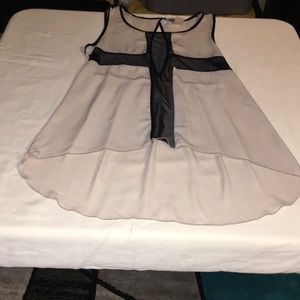 Medium  black and cream sleeves top.